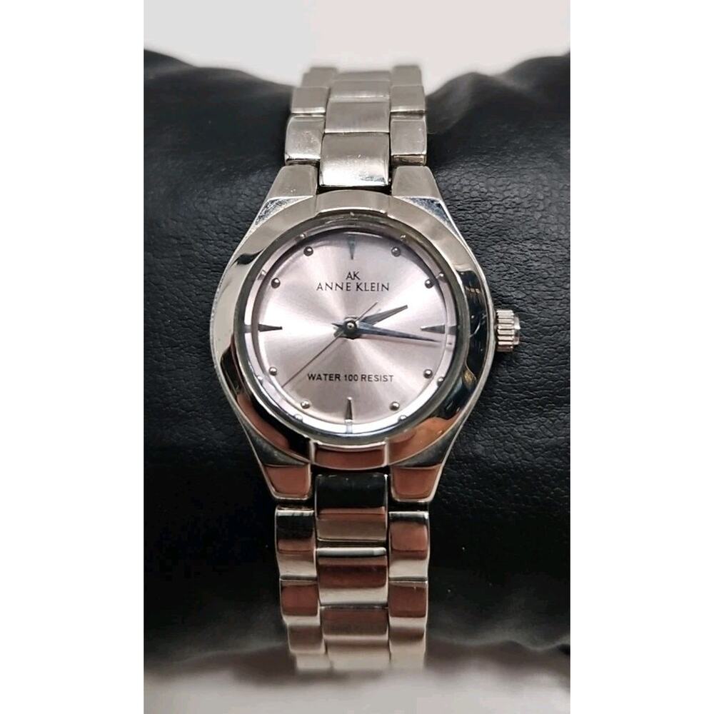 Anne Klein Silver Tone Pink Dial Wrist Watch Y121E 10/6811 New Battery W147